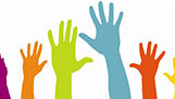 Hands raised in participation